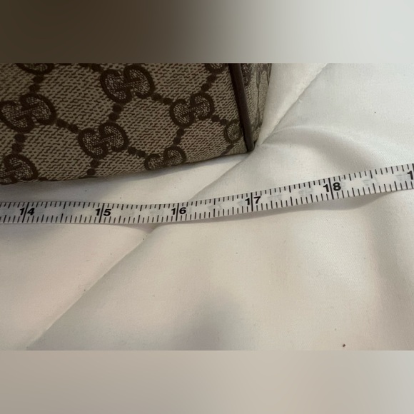 Gucci Beige and Brown GG Monogram duffel. - Picture 14 of 16